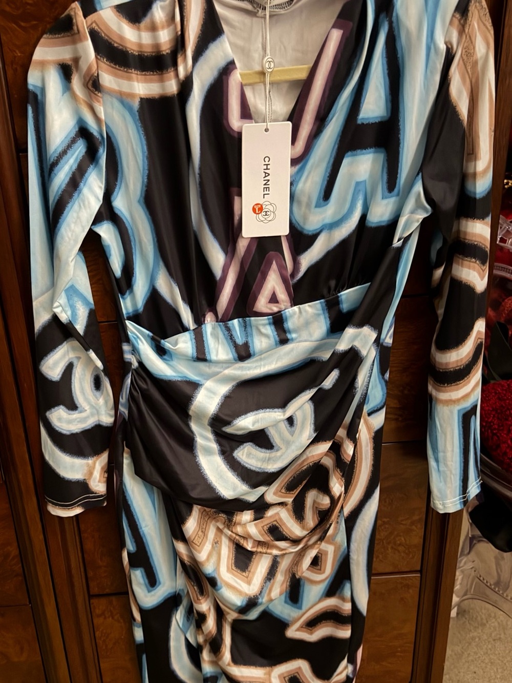 CHANEL Black Dress with Blue, Cream & Brown Graphic Logo Print